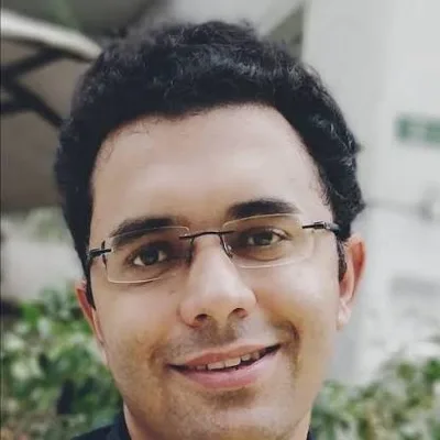 Dr. Amrit Kapoor