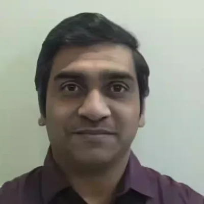 Dr. Mukesh Dhande