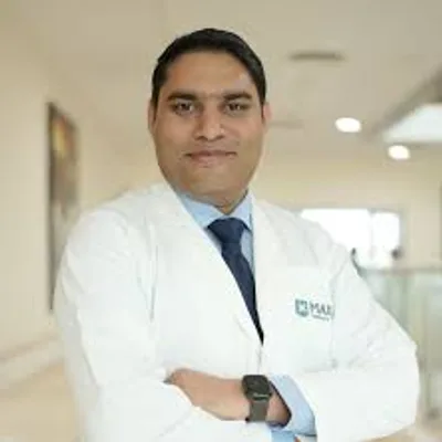 Dr. Mangesh Patil