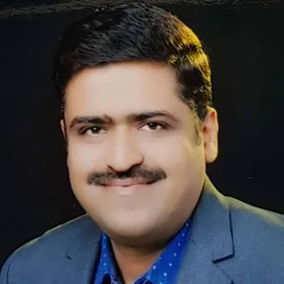 Dr. Vijay P Surana