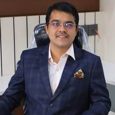 Dr. Kedar Takalkar