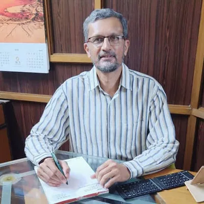 Dr. Shirish Ghan