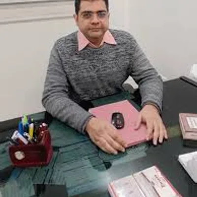 Dr. Vinay Tak