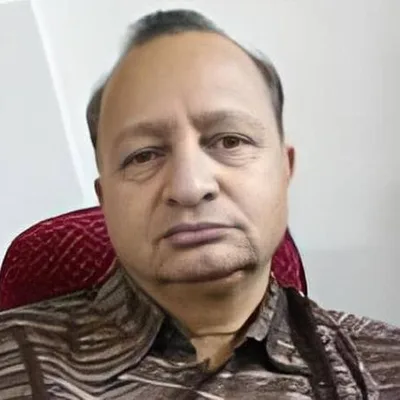 Dr. Girdhar Heda