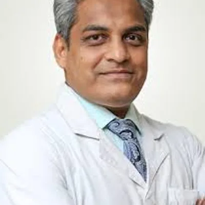 Dr. Arun Partani