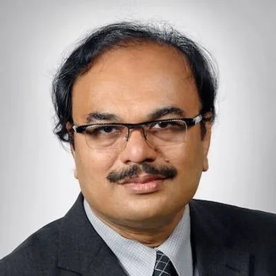Dr. Nirmal Surya