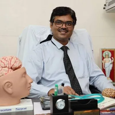 Dr. RAVINDRA R. PATIL