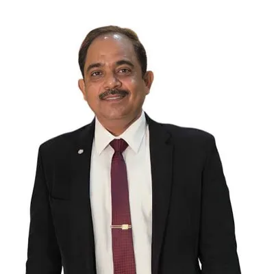 Dr. Kamad Dixit