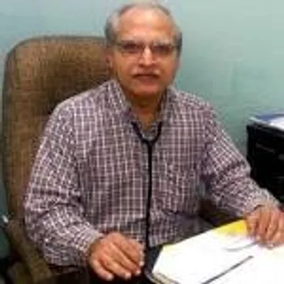 Dr. Tarun V Dave