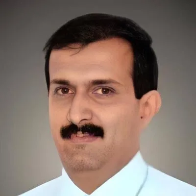 Dr. Kumar K S