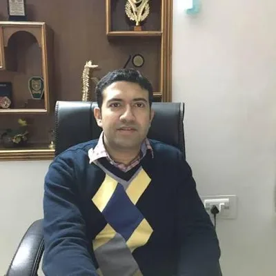 Dr. Rajan Sharma
